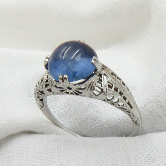 Circa 1930.  Blue Cabochon Sapphire Set In 14KT White Gold