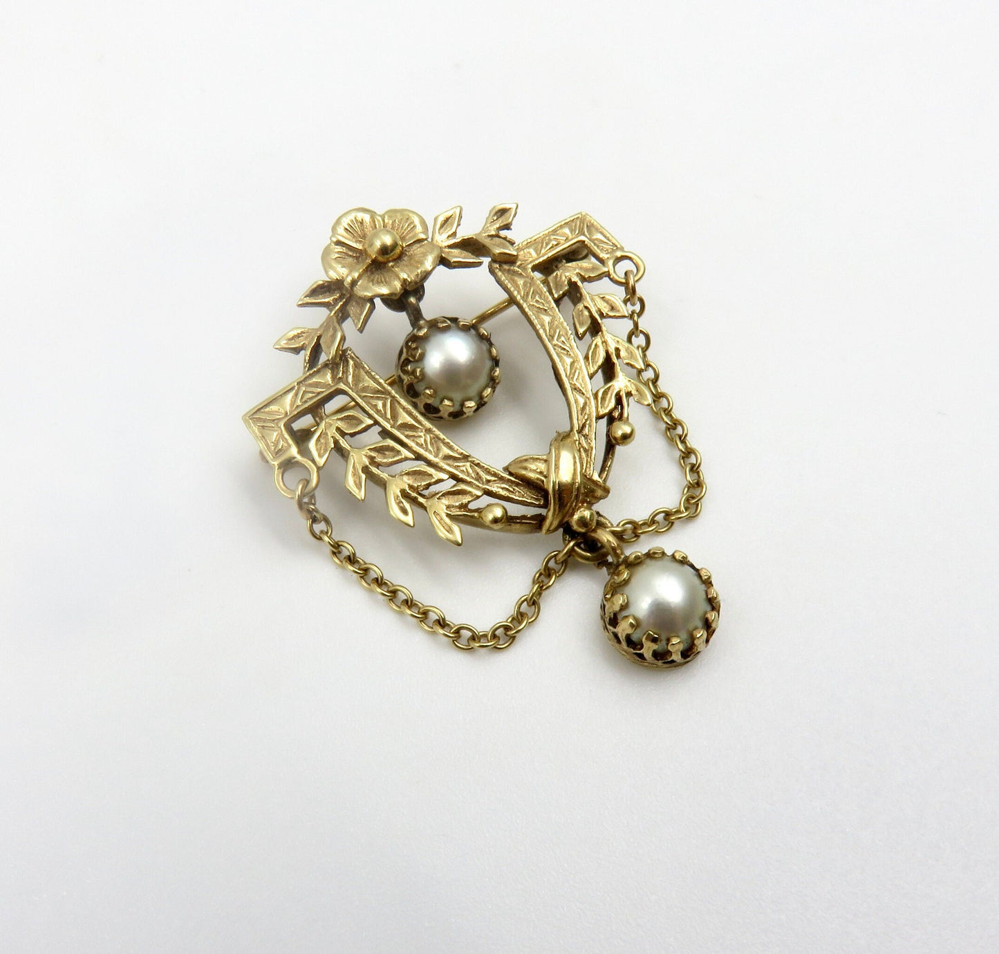 Circa 1900. 14kt Gold and Pearl Pendant Brooch