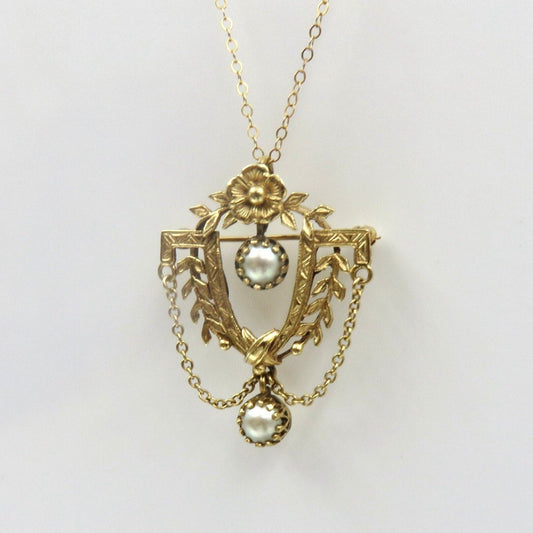 Circa 1900. 14kt Gold and Pearl Pendant Brooch