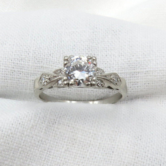 Circa 1930's, Platinum Ring Featuring a 0.56 ctw Round Brilliant Cut Diamond, VS1, Color E